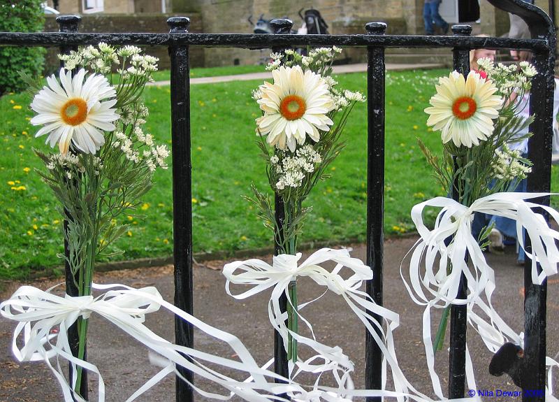 Flowery-Gate.jpg - "Flowery Gate"   - by Nita Dewar. The village school gate decorated for the May Day festival