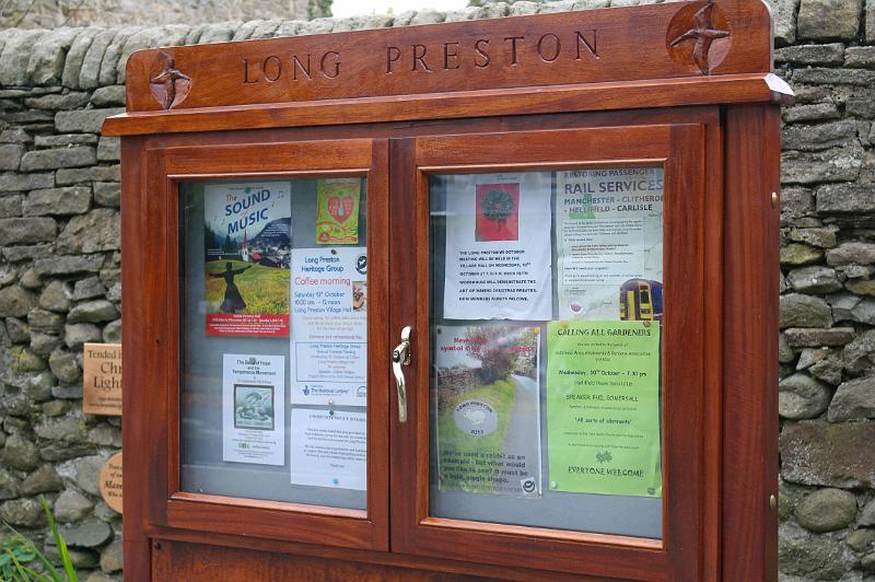 NB21.jpg - There we are . .  the new notice board in place.   Carving of the Curlews by Colin Etherington.    Lettering carved by Robin Benzie. 