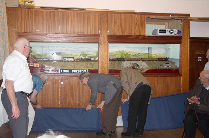 unveiling.jpg - The builders of the model unveil the Long Preston Station section,   which has been donated by Jamie Guest to the village.
